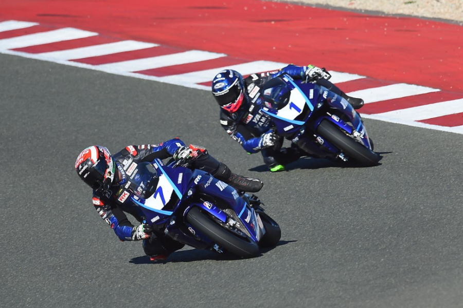 2 racers battling for first place during MotoAmerica race in Daytona